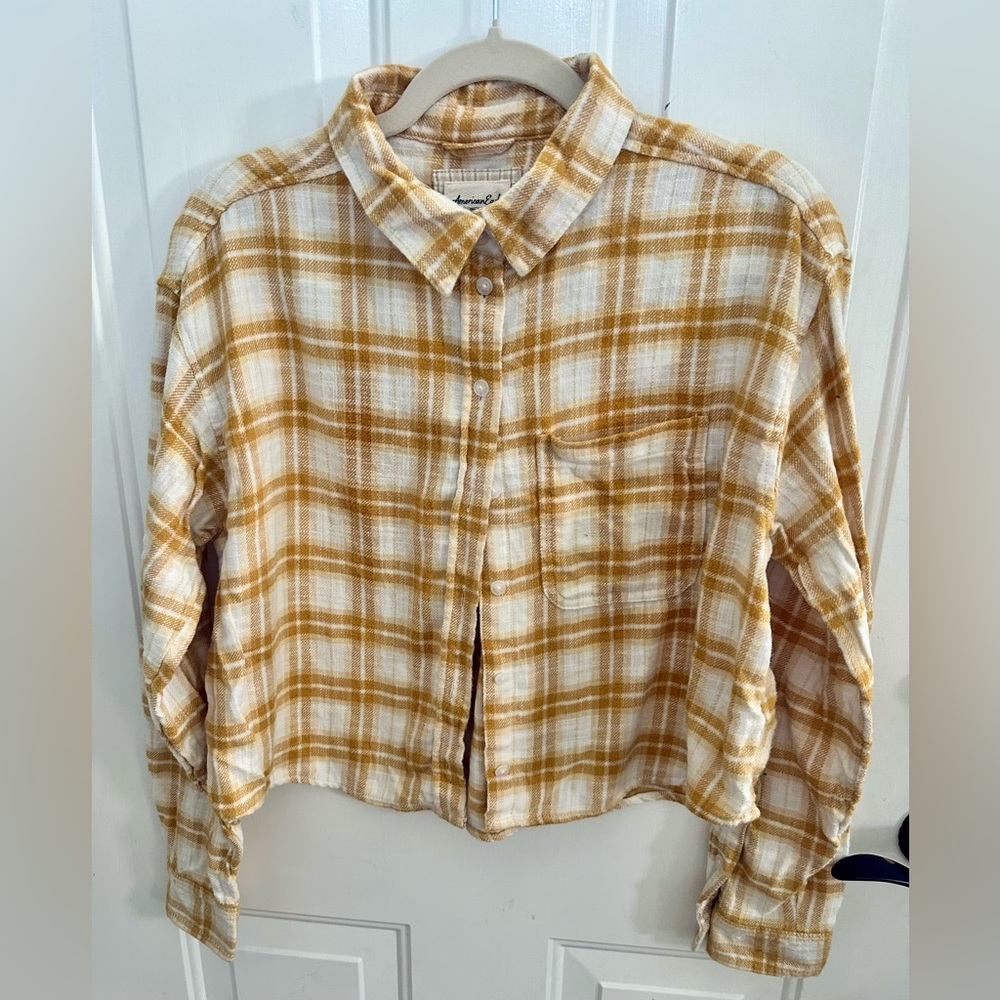 Cropped flannel with distressed sleeves at elbow